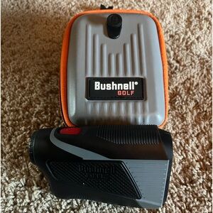 Bushnell V5 rangefinder. Black and grey.Perfection condition with carrying case